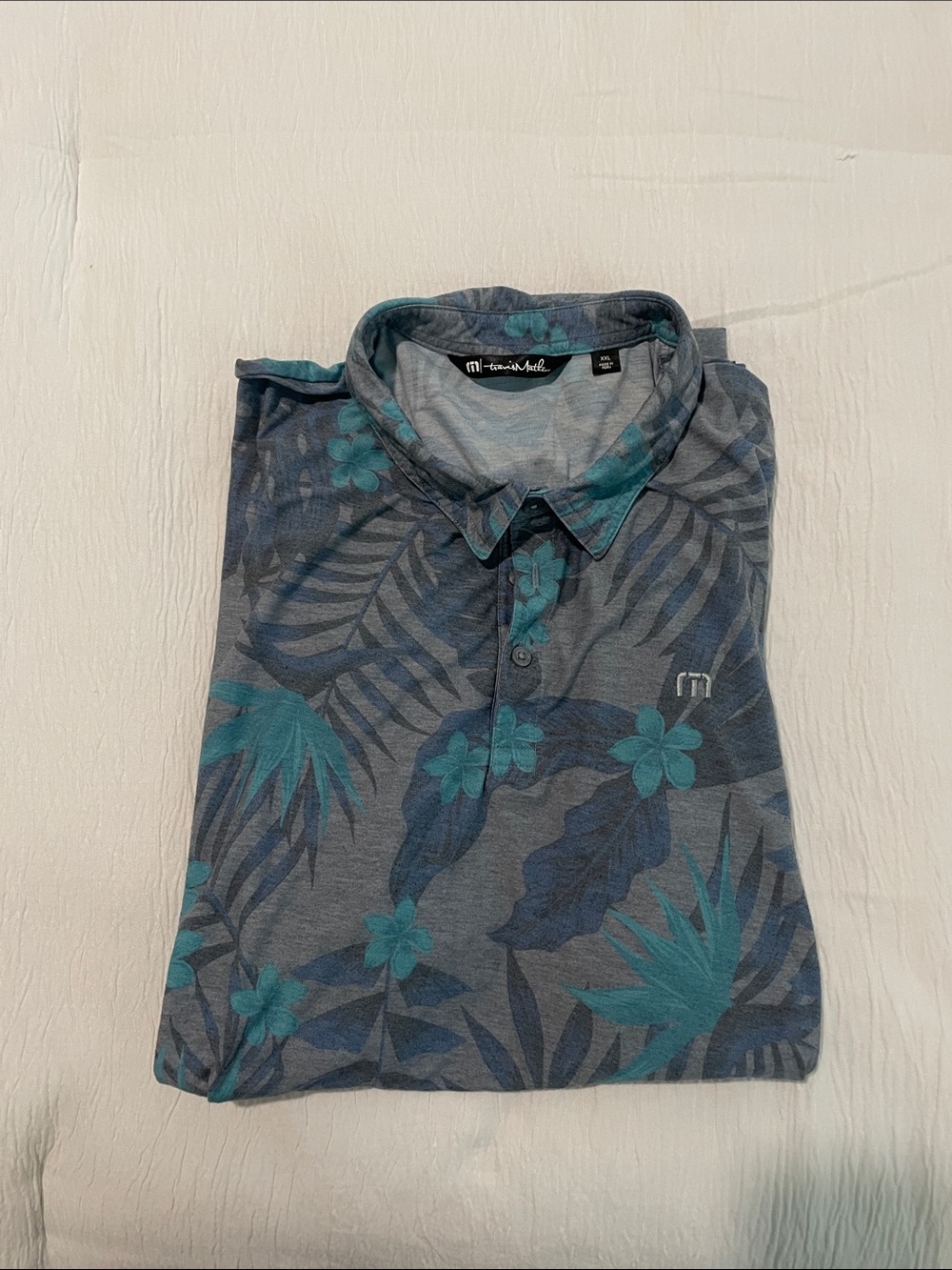 Travis Mathew Teal and Slate Floral Polo